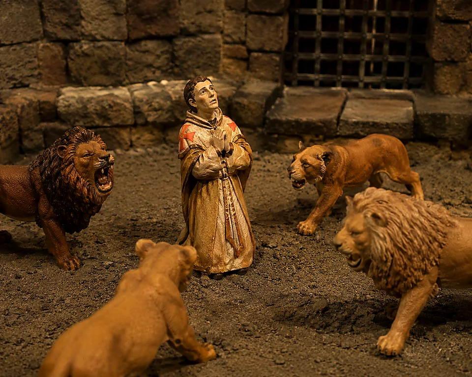 Diorama di martiri cristiani tra i leoni nel circo romano, con figure modellate a mano